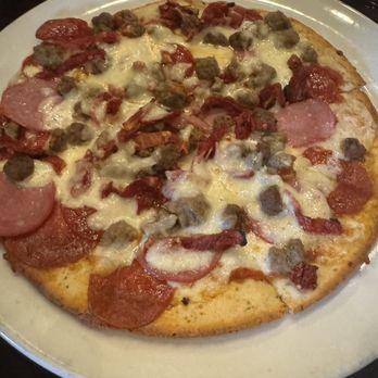 Bruno’s Italian Kitchen - 12in Meat Lovers Pizza - Italian Near Me - Beaumont, Texas Bruno’s Italian Kitchen - 12in Meat Lovers Pizza - Italian Near Me - Beaumont, Texas