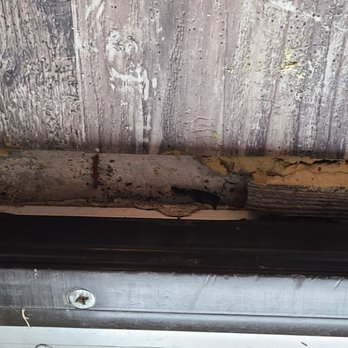 US Installation Group - Threshold not glued done correctly. Flooring not put completely under door Thresholds. - Carpet Installation Near Me - Venice, Florida