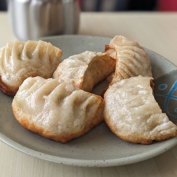 Wang's Shanghai Cuisine - Pan fried dumplings - Noodles Near Me - Vancouver, British Columbia Wang's Shanghai Cuisine - Pan fried dumplings - Noodles Near Me - Vancouver, British Columbia