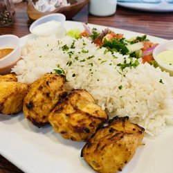Baba Ganoush Mediterranean Grill - Tender chicken kabob a d fluffy rice