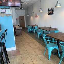 Poké-Poké - Seating and shuffle board table