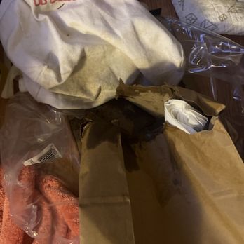 Dumpling Factory - Bag broke, soup spilled on the floor, I tried to clean it up and use cardboard to prevent the mess further. - Chinese Near Me - Honolulu, Hawaii