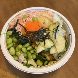 Spicy Salmon, Spicy Tuna, crab, edamame, ginger, cucumbers, masago, green onions, sesame ponzu, spicy mayo, seaweed and seaweed flakes. Spicy Salmon, Spicy Tuna, crab, edamame, ginger, cucumbers, masago, green onions, sesame ponzu, spicy mayo, seaweed and seaweed flakes.