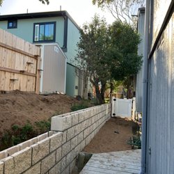 EZ Concrete Worx - After the old Woden retaining wall fence the had. We came in with a full block retaining wall to replace it . #los osos ca