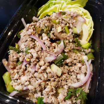 Ruen Pair - Pork larb salad (with a couple spoonfuls already scooped out) - Thai Near Me - Los Angeles, California Ruen Pair - Pork larb salad (with a couple spoonfuls already scooped out) - Thai Near Me - Los Angeles, California