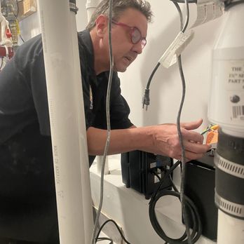 Rescue Plumbing - Plumber Rick installing a new sump pump - Plumbing Near Me - Lincolnwood, Illinois Rescue Plumbing - Plumber Rick installing a new sump pump - Plumbing Near Me - Lincolnwood, Illinois