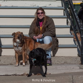 Sunflower Pet Sitting - Lori posing with the girls. - Dog Walkers Near Me - Leavenworth, Kansas Sunflower Pet Sitting - Lori posing with the girls. - Dog Walkers Near Me - Leavenworth, Kansas