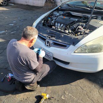 Independent Auto Repair - Fixing small things on your car with no extra charge. Example of them fixing my lopsided license plate. - Auto Repair Near Me - Van Nuys, California Independent Auto Repair - Fixing small things on your car with no extra charge. Example of them fixing my lopsided license plate. - Auto Repair Near Me - Van Nuys, California