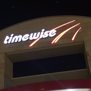 timewise - a timewise sign on a building - Gas Stations Near Me - Spring, Texas