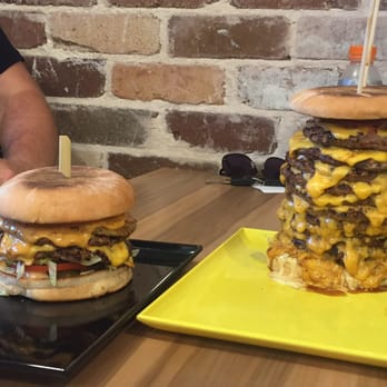 Lashings Gourmet Takeaway - Two custom burgers - a 4-patty number, and a colossal 12-patty, 12-cheese BEAST. - Burgers Near Me - Brighton-Le-Sands, NSW
