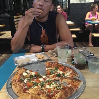 Pinthouse Pizza - Can't even stop eating that pizza roll for a photo - Pizza Near Me - Austin, Texas Pinthouse Pizza - Can't even stop eating that pizza roll for a photo - Pizza Near Me - Austin, Texas