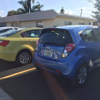 Hertz Rent A Car - They said I was supposed to get a car similar to a Kia Rio which is the yellow car. Instead they put me in a much smaller Chevy spark. - Car Rental Near Me - Tampa, Florida Hertz Rent A Car - They said I was supposed to get a car similar to a Kia Rio which is the yellow car. Instead they put me in a much smaller Chevy spark. - Car Rental Near Me - Tampa, Florida