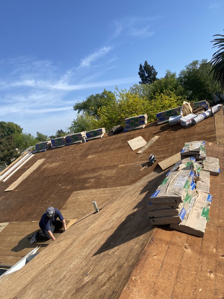 Slide of Oscar Construction DBA Roofing