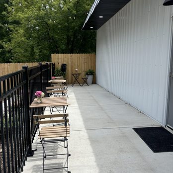 Red Egg Creamery - Side of building seating - Ice Cream & Frozen Yogurt Near Me - Spring Arbor, Michigan Red Egg Creamery - Side of building seating - Ice Cream & Frozen Yogurt Near Me - Spring Arbor, Michigan