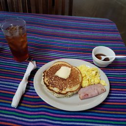 Hotcakes with eggs and ham. To be honest the picture isn't doing the pancake justice. Hotcakes with eggs and ham. To be honest the picture isn't doing the pancake justice.