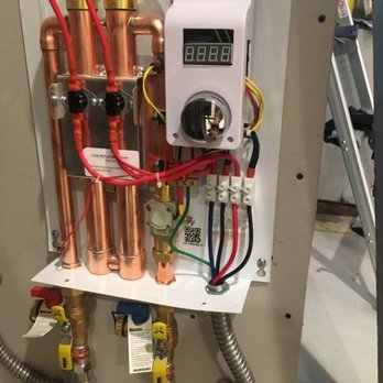 Mister Sparky - Tankless water heater installed by Mister Sparky - Electricians Near Me - Pompano Beach, Florida