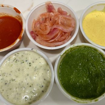 Naansense - Side of sauces. You can fill your own cups for takeout from their condiments bar. - Indian Near Me - Naperville, Illinois Naansense - Side of sauces. You can fill your own cups for takeout from their condiments bar. - Indian Near Me - Naperville, Illinois