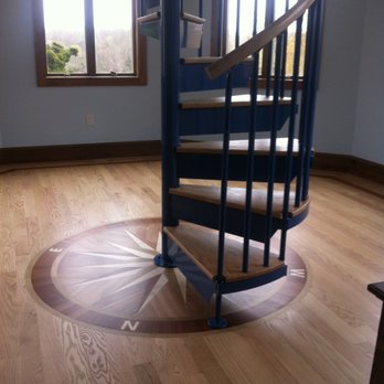 Sweeney Construction - a spiral staircase in a home - General Contractors Near Me - East Bridgewater, Massachusetts Sweeney Construction - a spiral staircase in a home - General Contractors Near Me - East Bridgewater, Massachusetts