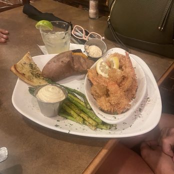 Adams Bistro - Fried shrimp dinner with asparagus and sweet potato. - Italian Near Me - Greenville, South Carolina Adams Bistro - Fried shrimp dinner with asparagus and sweet potato. - Italian Near Me - Greenville, South Carolina