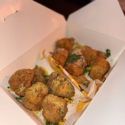Left is the lemon pepper wings (boneless) and right is the garlic parm