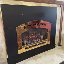 Secret Garden Bed & Breakfast - Fireplace in sitting room