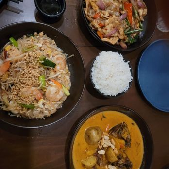Dok Mali Thai Kitchen - Pad Thai with Shrimp (Left), Drunken Noodle with Chicken (Top Right), and The Lion King (Bottom Right) - Thai Near Me - Portland, Maine Dok Mali Thai Kitchen - Pad Thai with Shrimp (Left), Drunken Noodle with Chicken (Top Right), and The Lion King (Bottom Right) - Thai Near Me - Portland, Maine