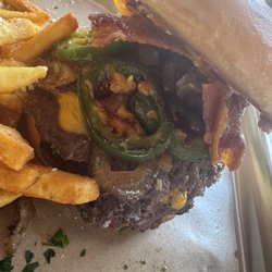 Dudley’s Sports Grill - Double smash burger...added bacon grilled jalapeños n grilled onions comes with Parmesan fries