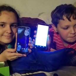 My kids with 2 new Moto G6's that I bought at Best Buy, because Westfield Mall's salespeople were scammy.