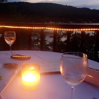 Ledge Water Steak House - The citronella candles are a lifesaver from the bugs - Steakhouses Near Me - Bristol, New Hampshire