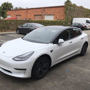 Photo of Concours Auto Spa - Torrance - Torrance, CA, United States. My Chewy with an Oreo vinyl design and chrome delete!