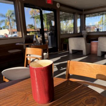 Chailo - Handmade ceramic cup containing Brown Butter Latte - Coffee & Tea Near Me - Costa Mesa, California Chailo - Handmade ceramic cup containing Brown Butter Latte - Coffee & Tea Near Me - Costa Mesa, California