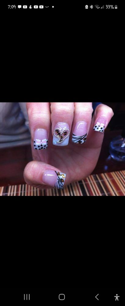 Nails By Jeanine Martinez Logo