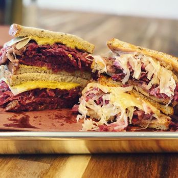 Otherside Deli and Sub - Third kind with Pastrami & Corned Beef (left) Reuben (right) - Delis Near Me - Austin, Texas