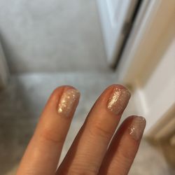 Nail Garden - Nail polish all over the sides on my skin. Nails cut way too shirt on the side.