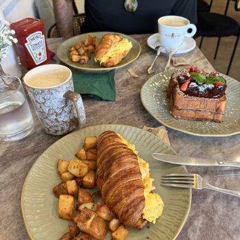 Flora - Egg sandwich (requested to have it on a croissant), berry French toast, latte and cappuccino - Breakfast & Brunch Near Me - San Diego, California
