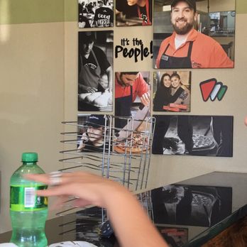 Pizza Guys - Wall decor with my friend's hand as she gets a drink - face was not permitted for posting. - Pizza Near Me - San Jose, California Pizza Guys - Wall decor with my friend's hand as she gets a drink - face was not permitted for posting. - Pizza Near Me - San Jose, California