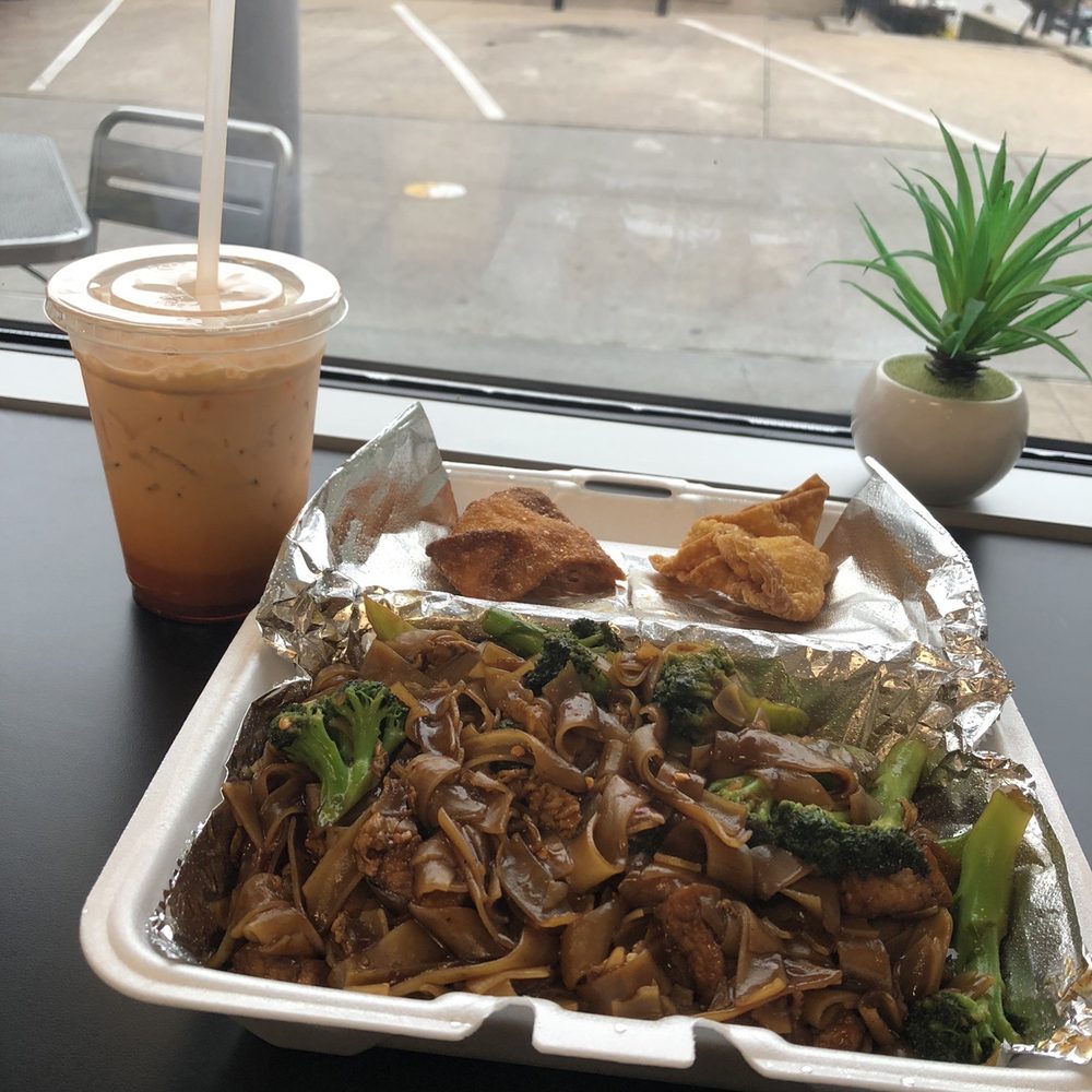 A2-2 Curry Rangoons (4pcs). SN2. Pad C-Ew with fried tofu, spice level 3/5, and nuts. Iced Thai Tea (I bought two they were so delicious). A2-2 Curry Rangoons (4pcs). SN2. Pad C-Ew with fried tofu, spice level 3/5, and nuts. Iced Thai Tea (I bought two they were so delicious).