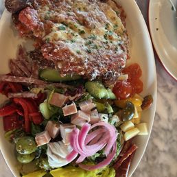 Chicken Parmesan, and an Italian cob salad Chicken Parmesan, and an Italian cob salad