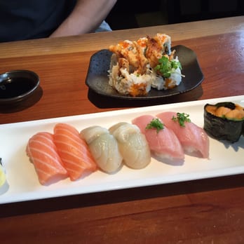 AKEMI Japanese Restaurant - From left to right: salmon, scallop, fatty tuna, and uni nigiri. Honestly don't remember what the roll was. Maybe spider...? - Japanese Near Me - Berkeley, California AKEMI Japanese Restaurant - From left to right: salmon, scallop, fatty tuna, and uni nigiri. Honestly don't remember what the roll was. Maybe spider...? - Japanese Near Me - Berkeley, California