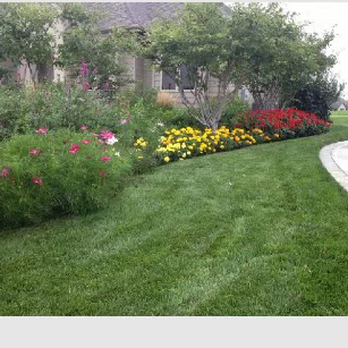 Coughlin Landscaping - a lawn with flowers and shrubs - Landscaping Near Me - Sioux City, Iowa Coughlin Landscaping - a lawn with flowers and shrubs - Landscaping Near Me - Sioux City, Iowa