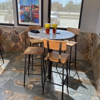 Taco Casa - a table and chairs in a restaurant - Tacos Near Me - Cypress, Texas
