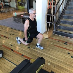 Body by Dave client Galen doing walking lunges.