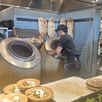 Rumi's Kitchen - The baking oven for Sesame Bread - Persian/Iranian Near Me - Atlanta, Georgia