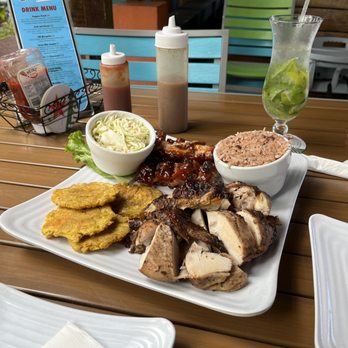 Pepper's Bar & Grill - jerk chicken, BBQ ribs, tostones, rice and beans, and coleslaw - Bars Near Me - George Town, UM