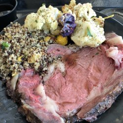 Hand carved Prime rib with quinoa and roasted tri-color cauliflower. Delicious.