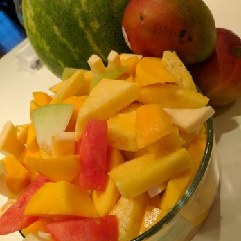Fantastik Fruit Cart - Mango, watermelon, honeydew melon, pineapple and coconut, all freshly peeled. - Fruits & Veggies Near Me - Chicago, Illinois Fantastik Fruit Cart - Mango, watermelon, honeydew melon, pineapple and coconut, all freshly peeled. - Fruits & Veggies Near Me - Chicago, Illinois