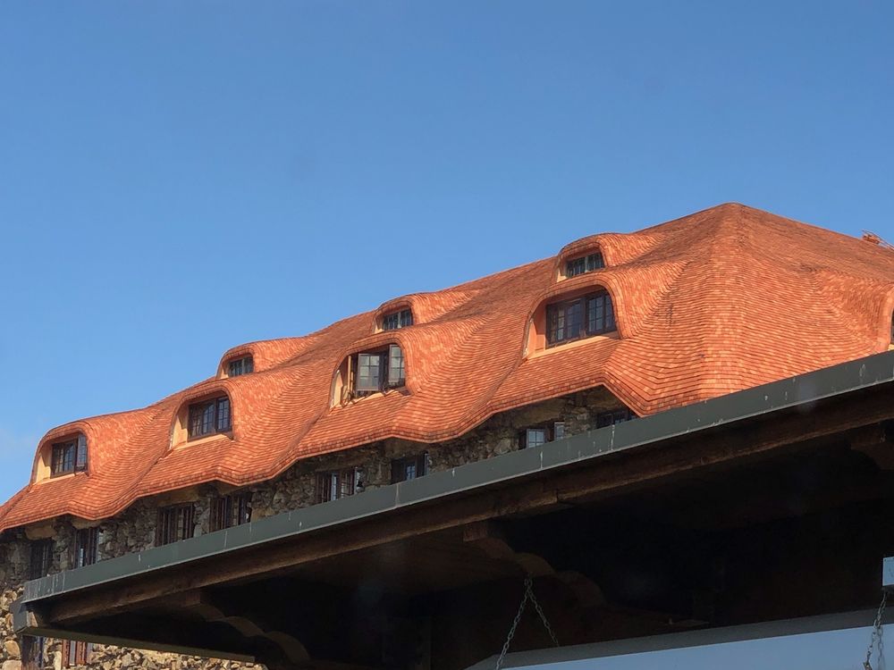 Slide of AMC Roofing