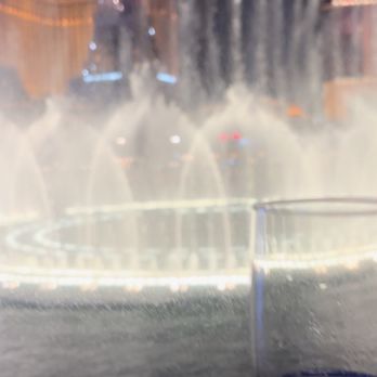 Lago - One of three tables against the glass wall with unobstructed view- FYI it's a $150 per person minimum spend to secure this - Italian Near Me - Las Vegas, Nevada Lago - One of three tables against the glass wall with unobstructed view- FYI it's a $150 per person minimum spend to secure this - Italian Near Me - Las Vegas, Nevada
