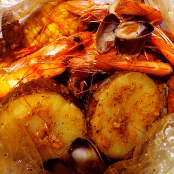 Shaking Crab - Combo #1 1.5lbs shrimp with clams, 2 corn, 2 potatoes and sausages. "All the above" sauce, mild - Cajun/Creole Near Me - Daly City, California Shaking Crab - Combo #1 1.5lbs shrimp with clams, 2 corn, 2 potatoes and sausages. "All the above" sauce, mild - Cajun/Creole Near Me - Daly City, California