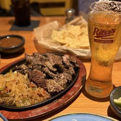 Rita's on the River - Delicious fajitas. Premier Corona